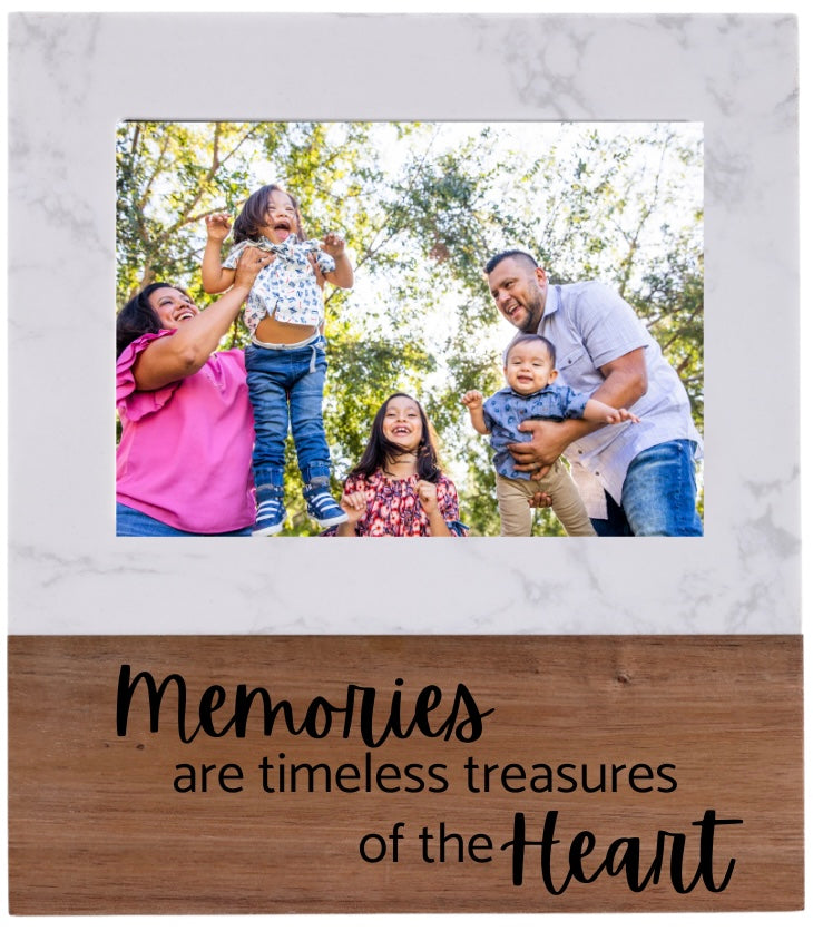 Family photo with 'Memories are timeless treasures of the heart' text on a wooden base.