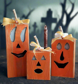 Wooden block halloween pumpkin set in a scary graveyard scene