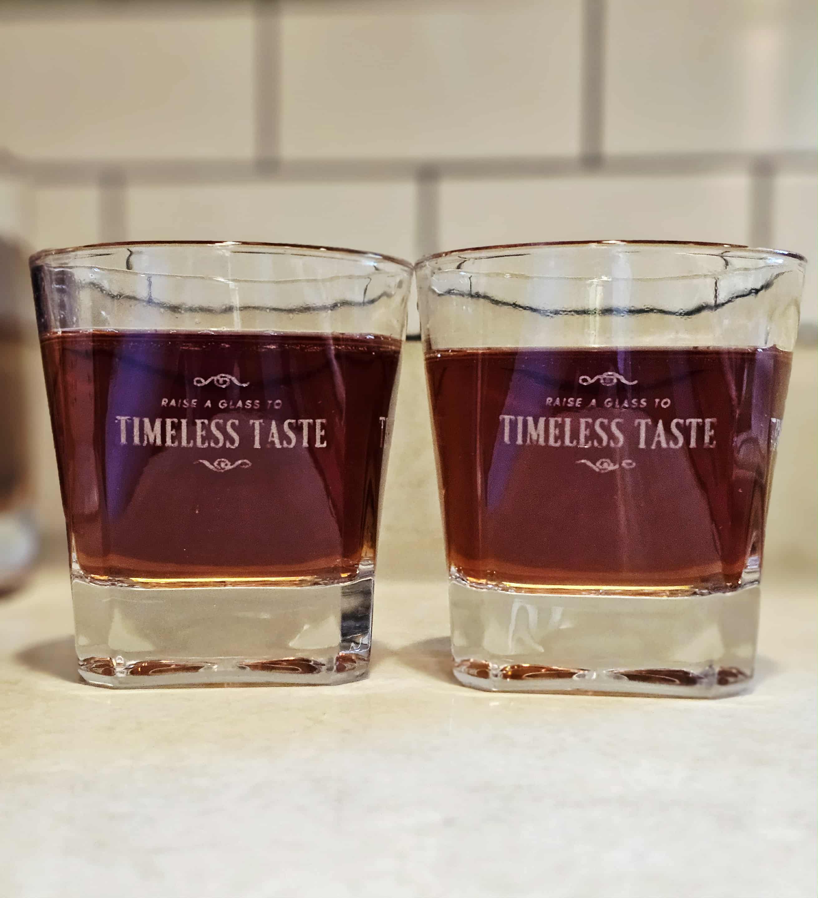2 Rocks Glasses engraved with Timeless Taste design