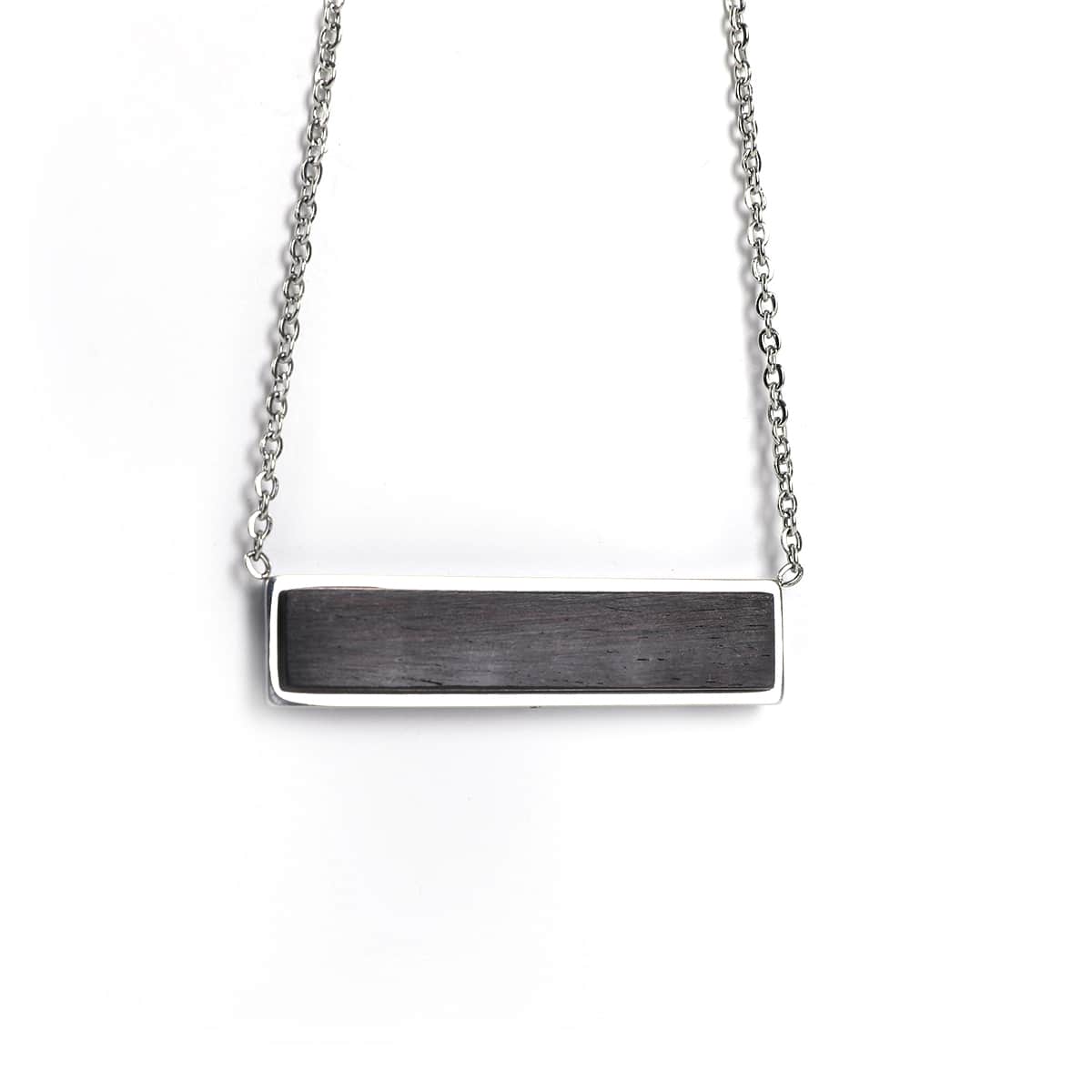 Necklace with a rectangular horizontal African Blackwood pendant on a white background